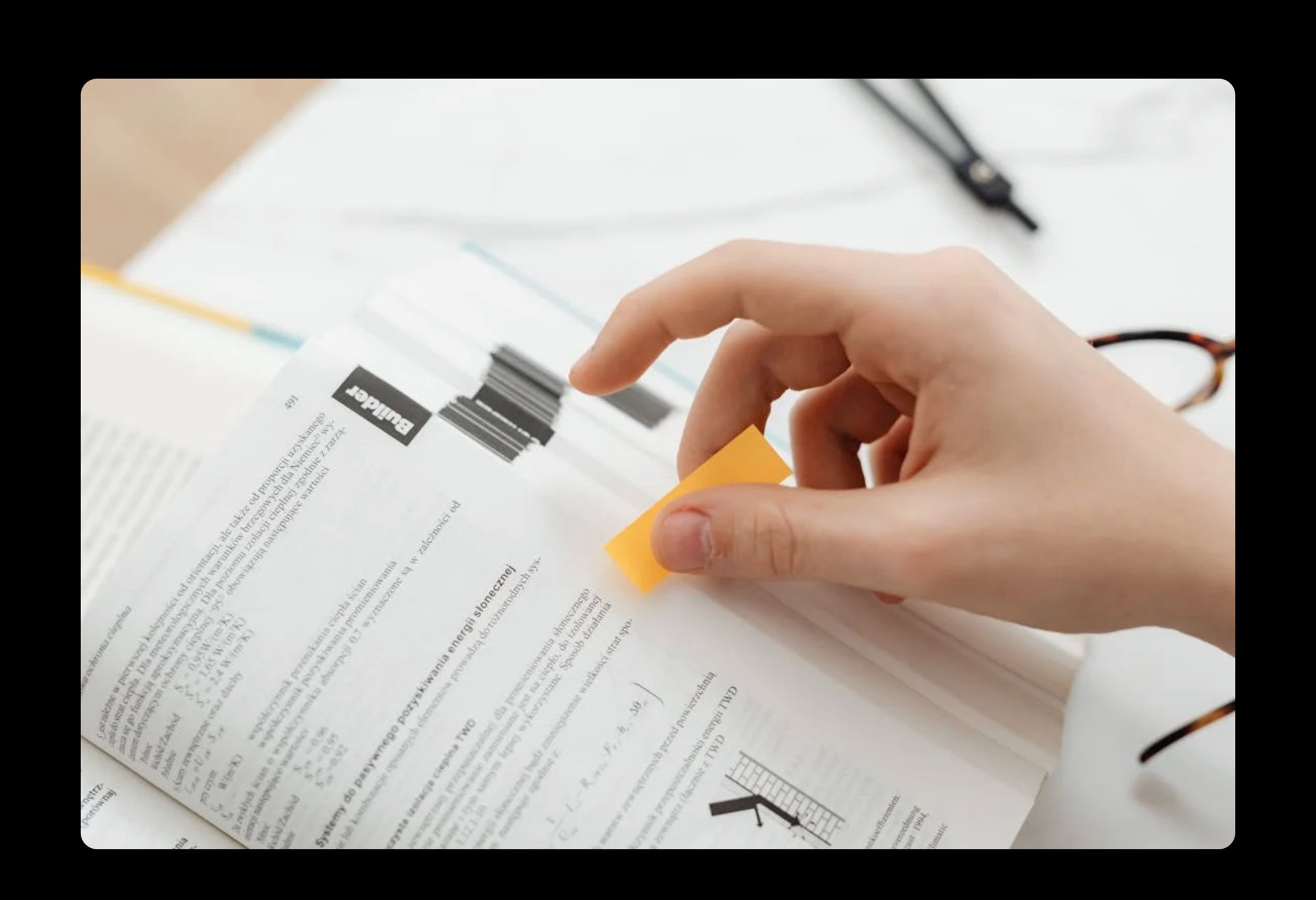 Student annotating textbook